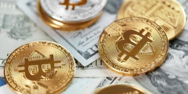 Digital Currency. Bitcoin Coin On Dollar Bills