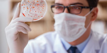 doctor-studying-virus-bacteria-lab_85869-6490