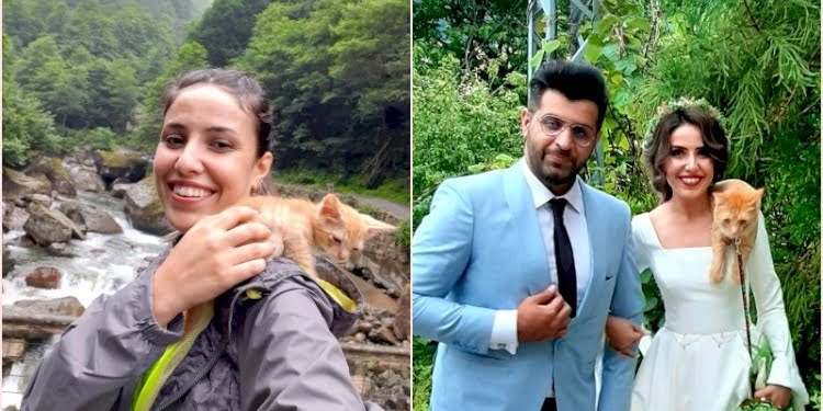 Kedisini her yere omzunda götüren ‘kedili kız’