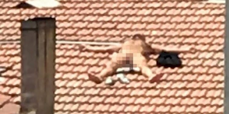 Burdur’da çatıda çıplak yatan kişi gözaltına alındı