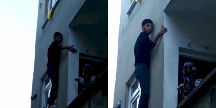 Pencerede mahsur kalan hırsız, bina sakinlerine yalvardı