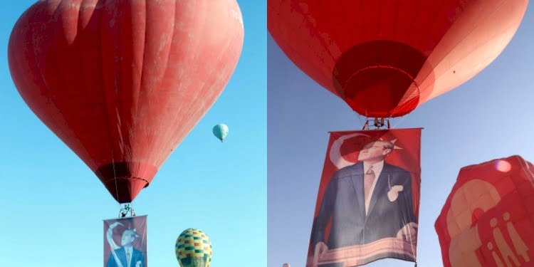 Kapadokya’da sıcak hava balonları Atatürk posteri ve bayrakla havalandı