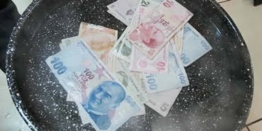 koronaviruse-karsi-banknotlari-suya-koyup100-derecede-kaynatiyor_5415_dhaphoto1