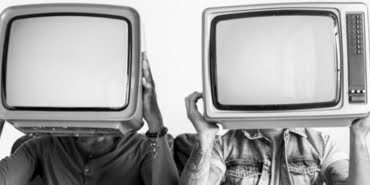 people-holding-retro-television-each-other_53876-14997