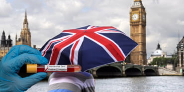 rear-view-young-man-looking-river-thames_1147-45