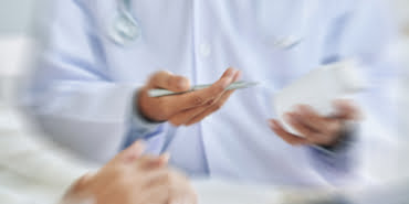 unrecognizable-female-doctor-recommending-medication-patient_1098-17465