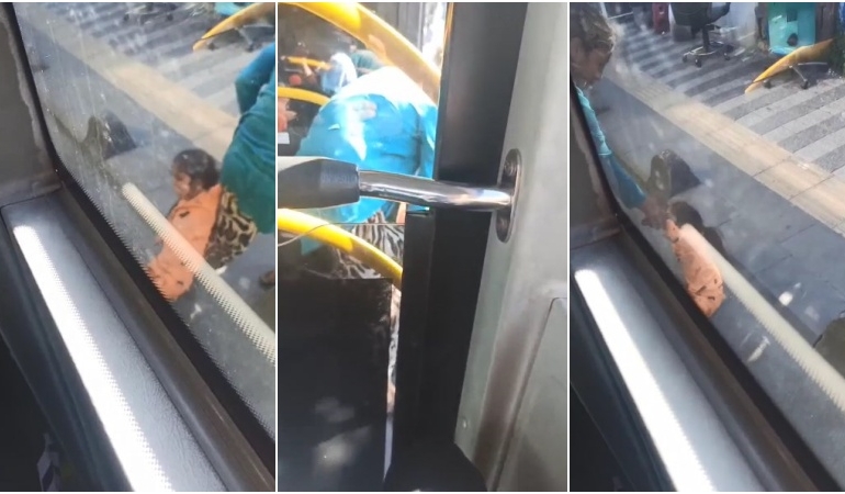 Otobüse binmek isteyen çocuğunu yerlerde sürükledi!