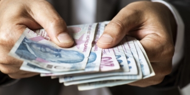 Man Giving Turkish Currency