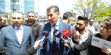 sinan-ogan-turkiyenin-krize-girmemesi-icin-sorumlugu-alacagiz_8568_dhaphoto1