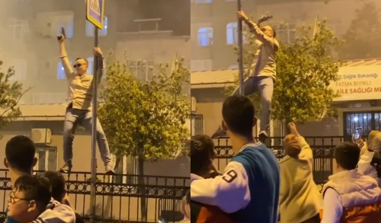 Asker eğlencesinde hem dans etti hem de silahla havaya ateş açtı