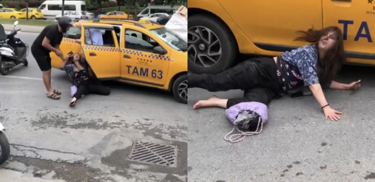 İlginç anlar… Kendini yere attı, taksinin altına girmeye çalıştı