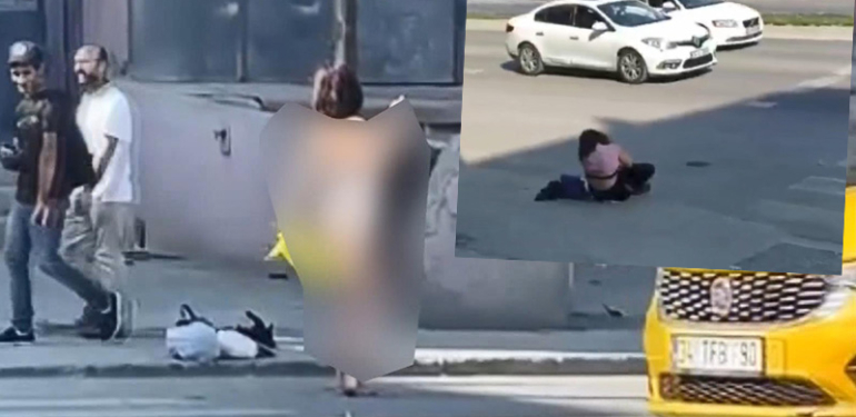 Yol kenarında soyunan kadını izleyen süreciler trafiği birbirine kattı