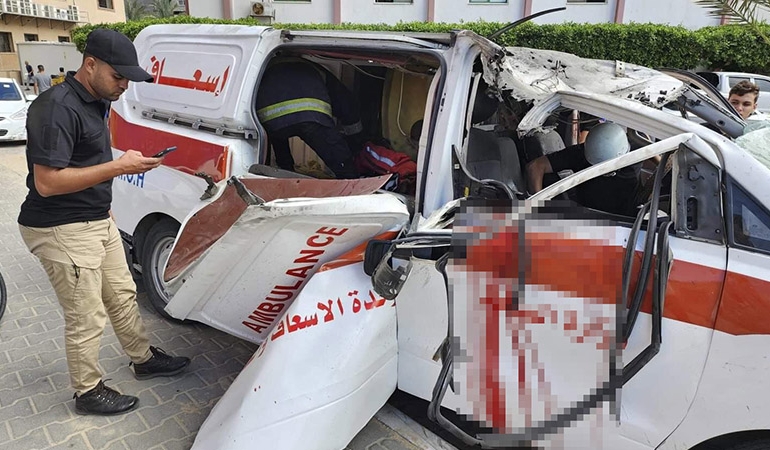 İsrail, hastane dibindeki binayı bombaladı, yardıma gidenleri de vurdu
