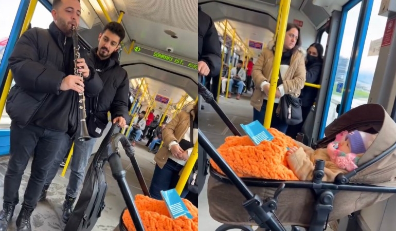 Metroda ağlayan bebeğe klarnetle ninni çaldılar